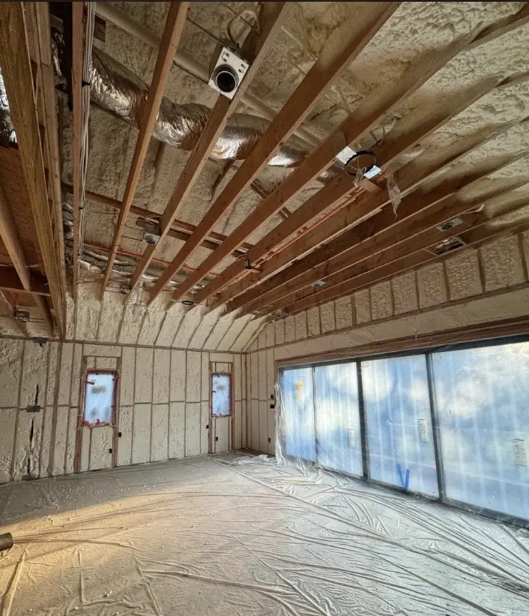 Interior walls and ceiling insulated with spray foam during new construction in Solon